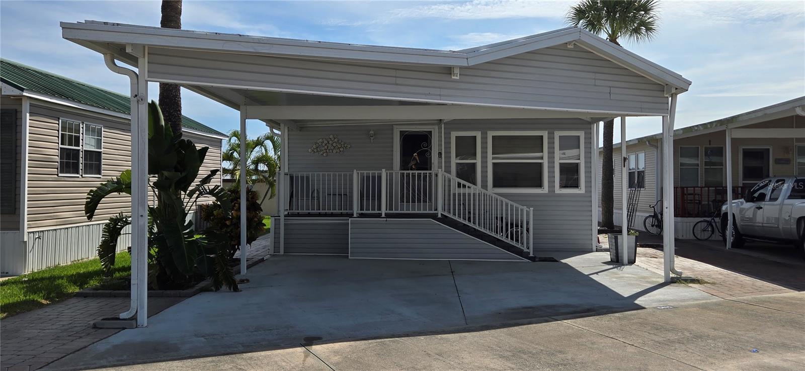 Welcome to Your Slice of Florida Paradise!
Enjoy sunny living in this charming and move-in-ready 2-bedroom, 1.5-bath home located in a vibrant, amenity-rich community. This home features a spacious eat-in kitchen with plenty of cabinet space and abundant storage throughout. The backyard backs up to a privacy wall-perfect for relaxing or entertaining outdoors with added seclusion. Move right in - window coverings are already installed, and there's nothing left to do but bring your personal touches. This well-maintained community offers something for everyone, including: a heated pool and spa, private marina with docks and boat ramp - ideal for boating or accessing world-renowned fishing spots. It also includes a recreation hall, library, fitness center, shuffleboard courts, horseshoe pits and a full calendar of fun activities and social events. Whether you're looking for a peaceful retreat or an active lifestyle, this home and community have it all. Don't miss this opportunity to live the Florida lifestyle you've been dreaming of!