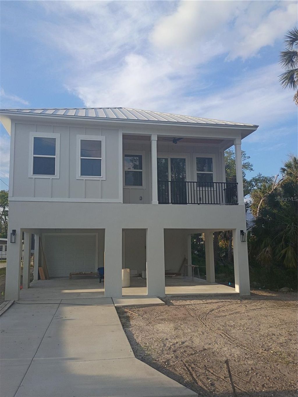 Photo of 158 E Spruce Street, Tarpon Springs, FL 34689 (MLS # W7885076)