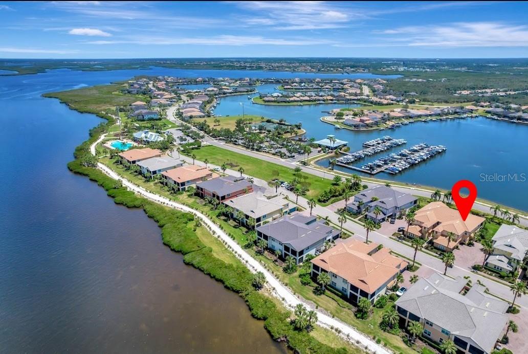 Welcome to Your Slice of Paradise in Tidewater Preserve!
Discover the ultimate Florida lifestyle in this beautifully updated first-floor carriage home, nestled within the exclusive, guard-gated community of Tidewater Preserve—a true waterfront haven along the scenic Manatee River.
Step inside to an inviting, open-concept layout with luxury vinyl plank flooring, soaring high ceilings, and an entertainer’s dream Cambria quartz island kitchen complete with solid wood cabinetry, a French door refrigerator, induction slide-in range (installed Dec. 2024), wine fridge, and even a second refrigerator in the garage. The elegant custom backsplash mirrors the movement of coastal waves, enhancing the interior’s charming nautical theme and relaxed ambiance.
This flexible 3-bedroom layout features a spacious primary suite with double-sink quartz vanity, custom built-in closet system, and a king-sized platform bed. The split-bedroom plan offers privacy for guests in the sunny second bedroom and plenty of room for a home office, den, or third bedroom.
Enjoy tranquil views of the lagoon from your private lanai, the perfect spot for morning coffee or winding down at sunset.
Offered fully furnished (optional), this home is truly move-in ready, allowing you to start living your best life from day one.
Outside your door, Tidewater Preserve delivers resort-style living every single day. Enjoy:
• A marina with boat slips and lifts, with direct access to the Gulf of America
• Three sparkling pools, including a beach-entry main pool
• Two state-of-the-art fitness centers
• Tennis courts, kayak launch, and nature trail with scenic overlook
• Pet-friendly amenities including a dog park and open green spaces
• A vibrant social calendar featuring boat parades, live music, themed events, fitness classes, and more!
All landscaping and yard maintenance are handled by the HOA—giving you more time to enjoy nearby hot spots like Anna Maria Island, Siesta Key, St. Pete, and Sarasota—or simply cruise the river to waterfront dining destinations.
Don’t miss this rare opportunity to own a waterfront retreat offering lifestyle, luxury, and value in one of Bradenton’s most sought-after communities.
Call or text to schedule your private showing today—because this one won’t last!
“Cleared to Close” and ready for your next chapter in paradise.