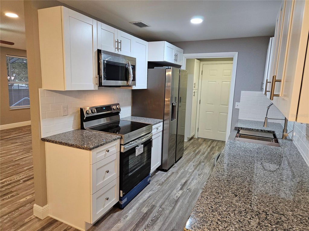 Photo of 5008 Cynthia Lane, Spring Hill, FL 34606 (MLS # W7889944)