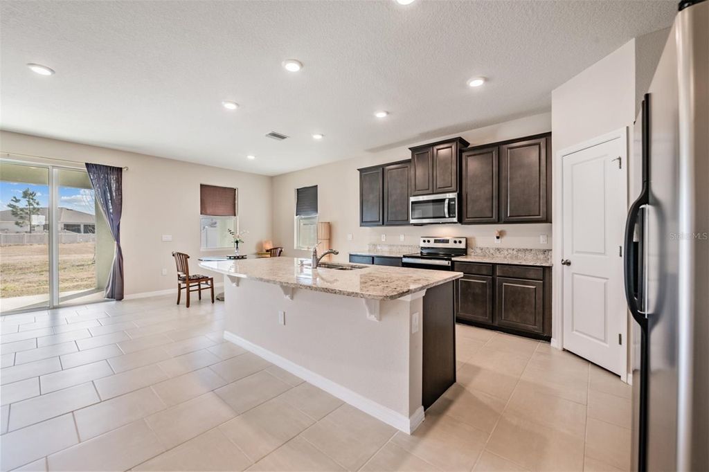 Photo of 10653 Tally Fawn Loop, San Antonio, FL 33576 (MLS # TB8473574)