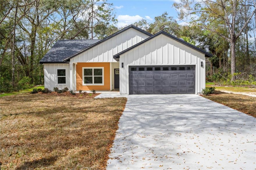 Brand New Home in Golf Course Community with no HOA fees!! Don’t miss this stunning new 3 bedroom, 2 bath boasting features of a custom home sitting on a spacious .53 acre corner lot in Chiefland Country Estates. Designed for country living with modern touches, this home features 9-foot ceilings, modern fireplace, luxury vinyl plank flooring, and quartz countertops throughout. The stylish kitchen includes a large island, apron sink, pot filler, quartz backsplash, pantry, decorative lighting, and stainless steel appliances (refrigerator, electric range, microwave hood, garbage disposal, and dishwasher all included). The open floor plan flows seamlessly to a covered front porch and covered back patio, perfect for relaxing or entertaining. The spacious primary suite offers a walk-in closet, double vanities, free standing tub, beautifully tiled curb-less shower with linear drain, and access to lanai. Enjoy added convenience with an indoor laundry room with linen closet, built in mud area, and an oversized 2-car garage. Located just 5 minutes from Manatee Springs State Park and the public boat ramp at Clay Landing on the Suwannee River, outdoor adventure is right at your doorstep. Don't miss out on your slice of paradise!