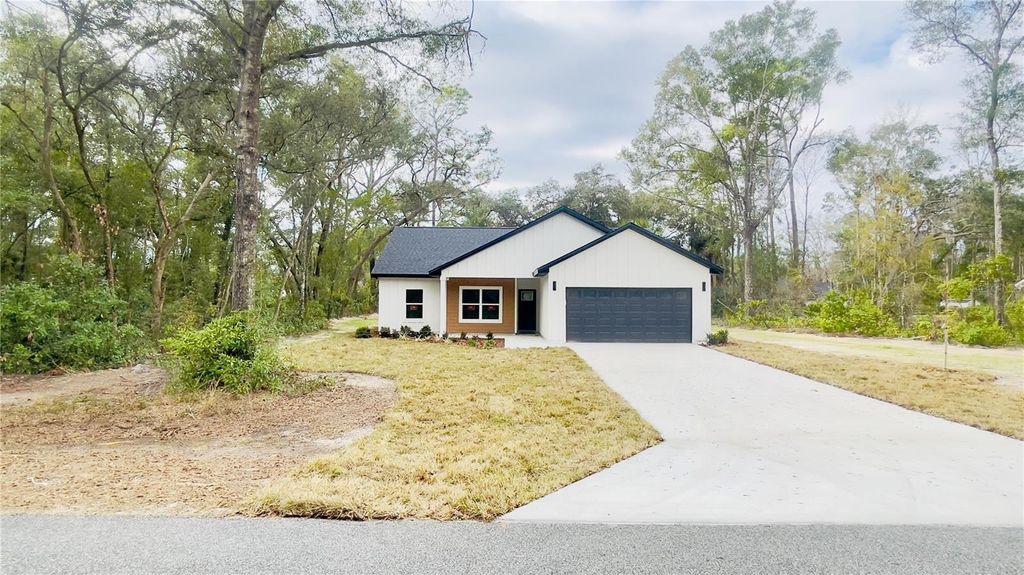 Photo of 11380 NW 92nd Ct, Chiefland, FL 32626 (MLS # GC536407)