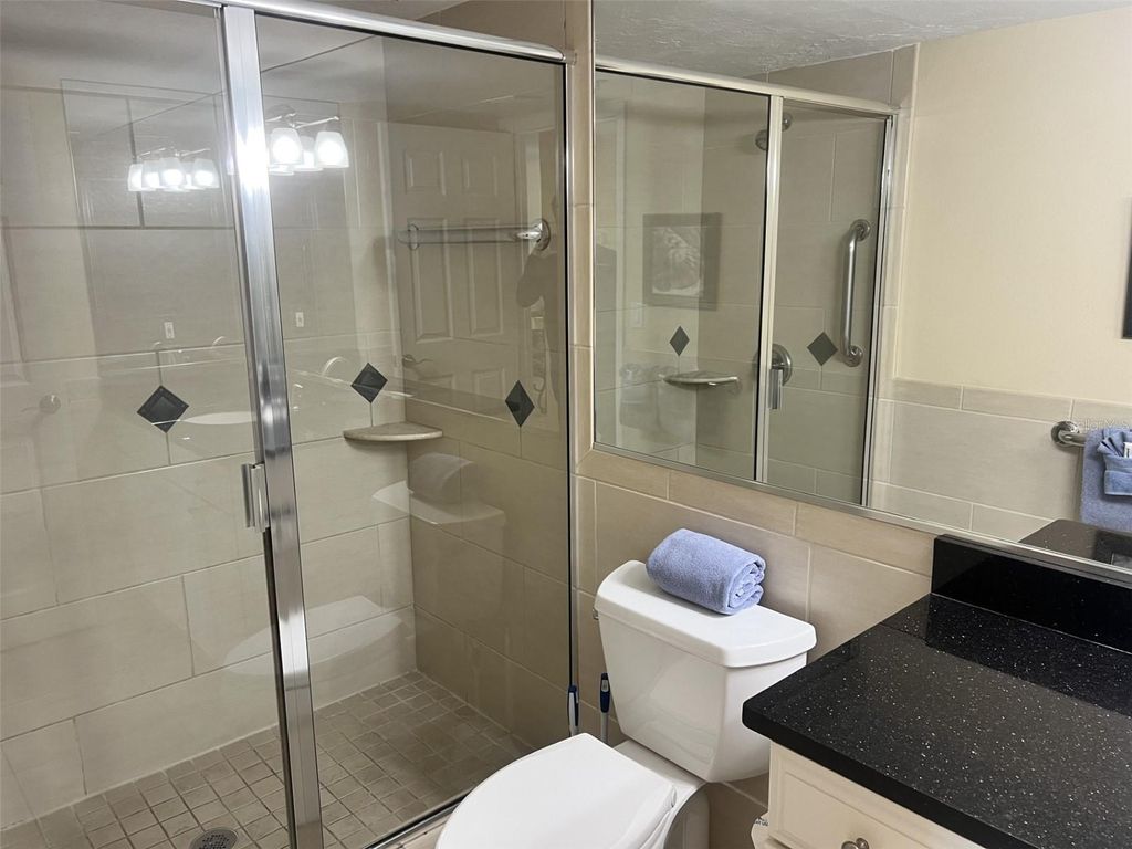 Photo of 1001 Point Of Rocks Road #310, Sarasota, FL 34242 (MLS # TB8469024)