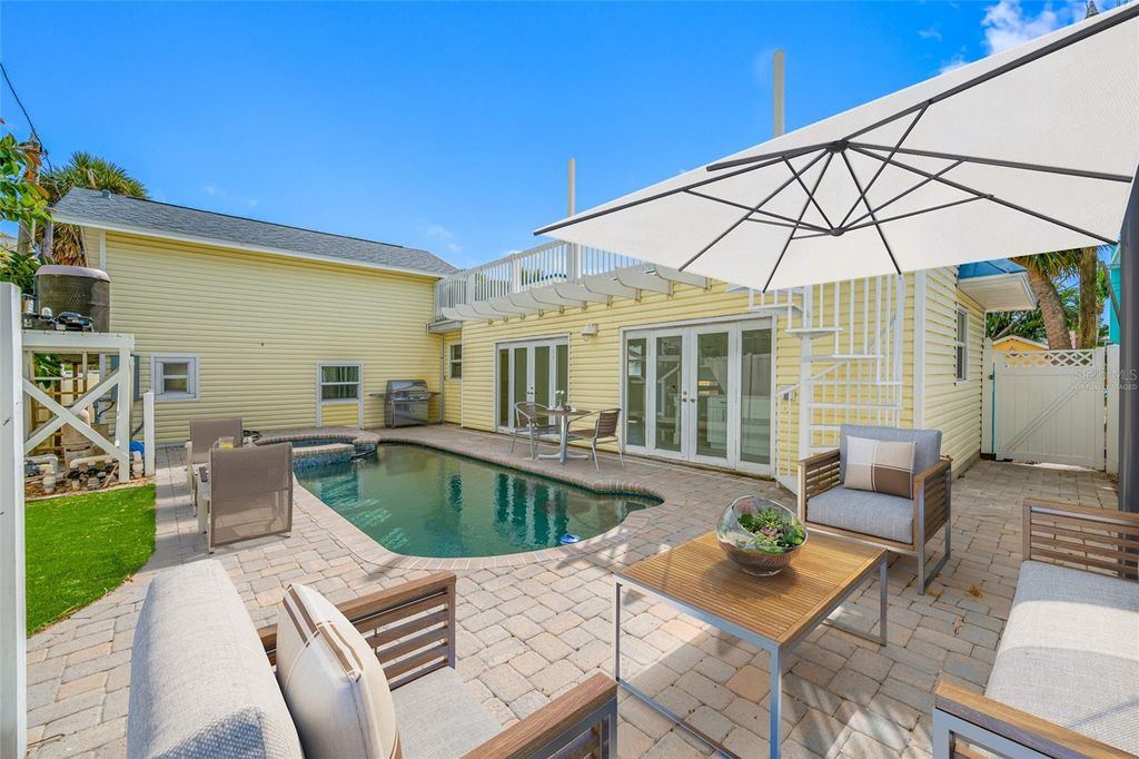 Photo of 130 87th Avenue, Treasure Island, FL 33706 (MLS # TB8441955)