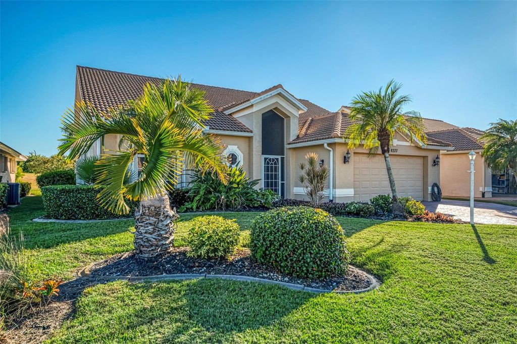 Photo of 8377 Parkside Drive, Englewood, FL 34224 (MLS # D6144729)