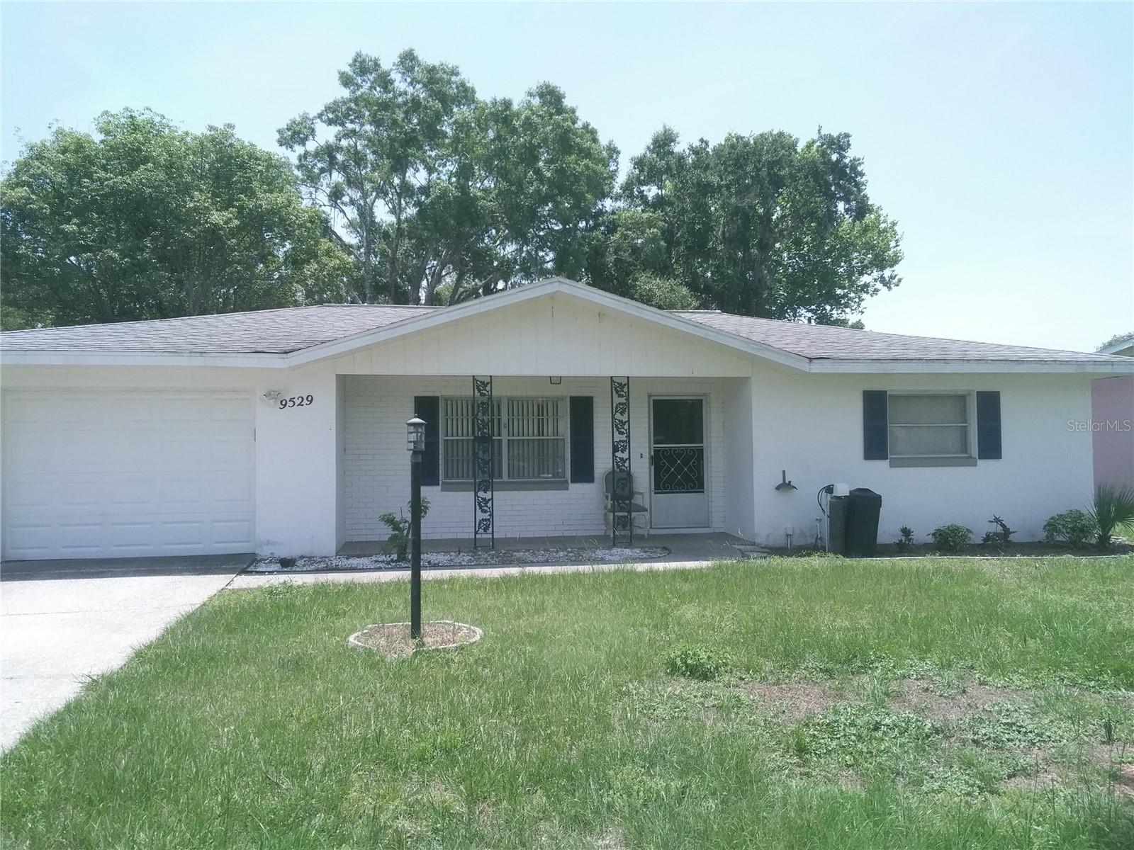 Very nice 2 bedroom 1 1/2 bath home in Inverness. The home has a large living room, separate dining area, galley kitchen, 2 large bedrooms and inside washer/dryer hook ups. There is a large enclosed porch with AC unit and an attached garage. The large back yard is fenced and the property is in close proximity to shopping.