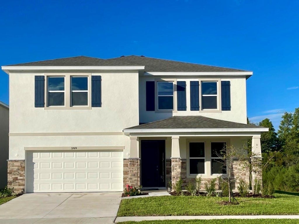 Photo of 32474 Rosepine Boulevard, Wesley Chapel, FL 33543 (MLS # J1005496)