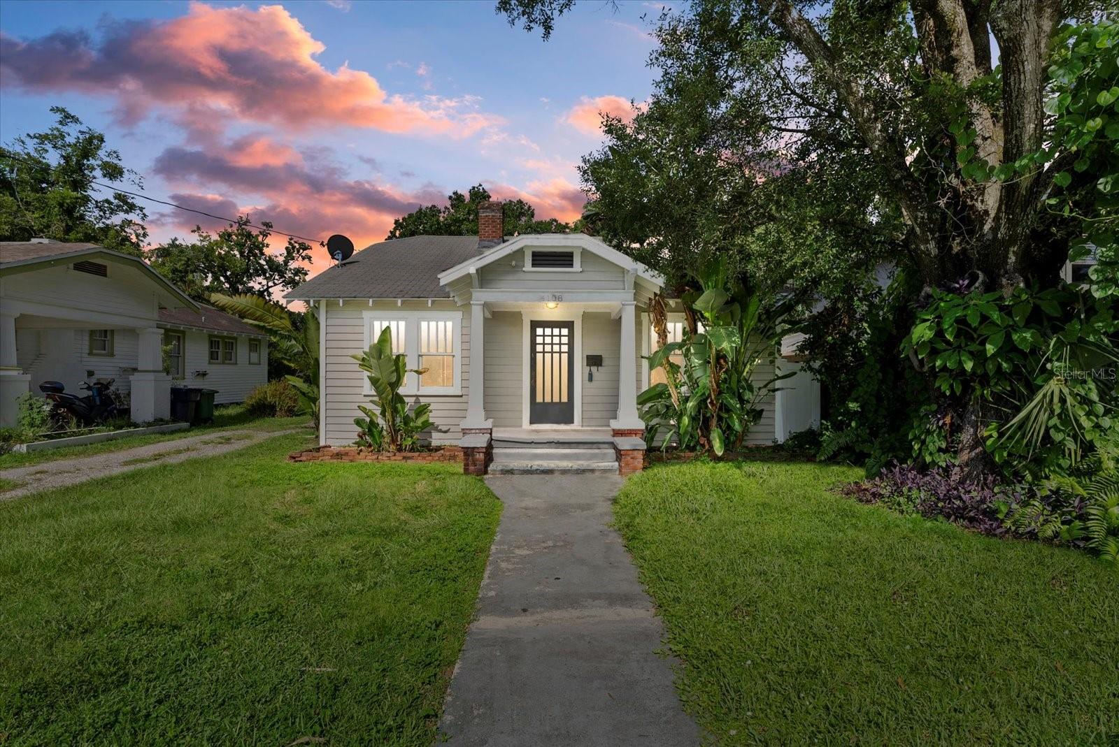 Discover the charm and opportunity in this 1925 bungalow located in Tampa’s sought-after South Seminole Heights neighborhood. Featuring 2 bedrooms, 1 bathroom, a cozy fireplace, and hardwood floors across approximately 1,200 square feet, this home sits on a generous 5,700± square foot lot. The inviting front porch and early-Florida architectural details offer timeless curb appeal, while the spacious yard provides room for gardening, entertaining, or future expansion. Inside, the home retains much of its original character but is ready for your vision and updates to truly shine. Perfect for buyers seeking a property they can personalize or for investors looking to add value, this location is minutes from Bay area dining, coffee shops, parks, and all the eclectic charm Seminole Heights has to offer. With its combination of historic character, great bones, and TLC potential, this property is a rare find in today’s market.