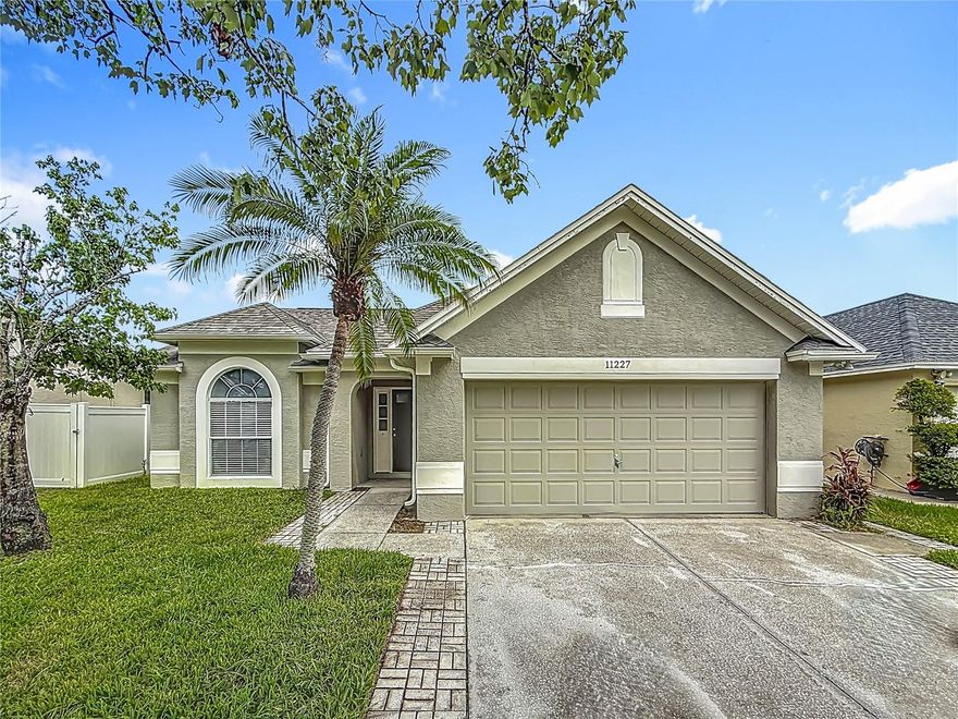 $20,000 PRICE REDUCTION!     Discover your dream home at 11227 Thicket Ct, Tampa, FL 33624, a beautifully updated one-story single-family residence nestled in the heart of the desirable Plantation community. This charming 3-bedroom, 2-bathroom home spans 1,550 square feet and boasts a modern, open layout perfect for both relaxation and entertaining. The completely renovated kitchen shines with sleek white shaker cabinets, stainless steel appliances, and elegant Corian countertops, complemented by stylish tile flooring. Both bathrooms have been fully updated with contemporary fixtures and finishes, while wood-look laminate flooring flows seamlessly throughout the home, adding warmth and durability. Recent upgrades, including fresh interior and exterior paint, new gutters, and a re-screened rear patio, ensure move-in-ready convenience and low maintenance. Enjoy peace of mind with 2020 Roof, 2020 Water Heater and 2019 AC.  The attached 2-car garage provides ample storage and parking. As part of the Plantation Homeowners Inc., residents enjoy access to exceptional amenities, including a clubhouse, two sparkling pools, basketball and racquetball courts, baseball and soccer fields, a playground, and a dog park, all set amidst 55 acres of scenic lakes and 64 acres of recreational spaces. Perfectly located, this home offers easy access to Tampa’s vibrant attractions within a 20-mile radius, such as the thrilling rides at Busch Gardens (10 miles), the cultural exhibits at the Tampa Museum of Art (12 miles), and the serene trails of Lettuce Lake Park (15 miles). Enjoy shopping and dining at Citrus Park Mall (5 miles) or take a short drive to the beautiful beaches of Clearwater (18 miles). With its prime location, modern upgrades, and community perks, 11227 Thicket Ct is the ideal place to call home.