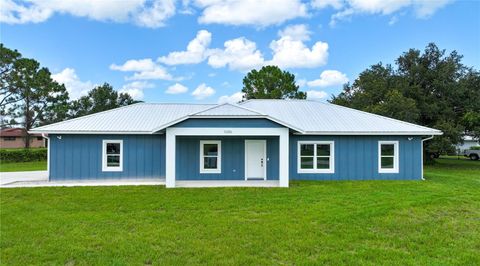 Photo of 11286 NE 3rd Circle, Okeechobee, FL 34972 (MLS # OK225427)