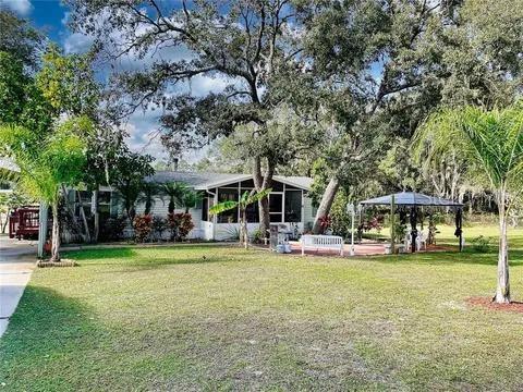 This inviting manufactured home offers comfort, functionality, and the best of Florida living. This home has an open and airy layout with a spacious living area, a well-equipped kitchen with plenty of cabinet space, and a cozy dining area perfect for family meals or entertaining guests. Step outside and enjoy your own private backyard oasis — complete with a patio deck and above-ground pool, ideal for relaxing, entertaining, and soaking up the Florida sunshine. The yard offers plenty of room for outdoor activities, gardening, or pets to play.
Additional highlights include a driveway with ample parking, a carport, and a peaceful setting in a quiet Davenport neighborhood. Located close to shopping, dining, and major highways, this home offers convenient access to all that Central Florida has to give — including world-class attractions, beautiful parks, and local amenities.
