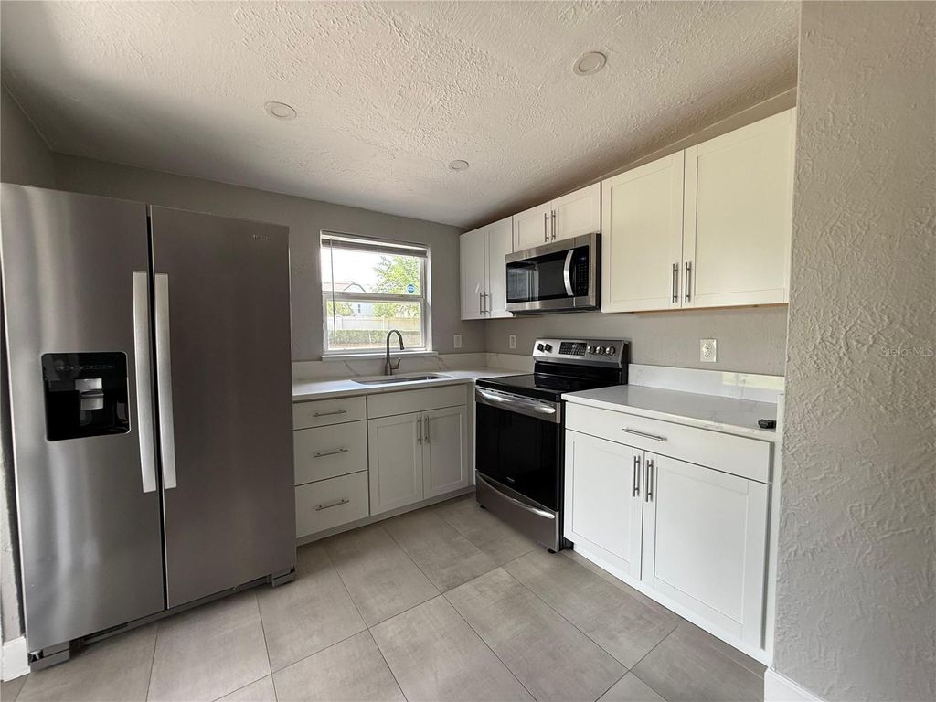 Photo of 5212 Old Cheney Highway, Orlando, FL 32807 (MLS # TB8508891)