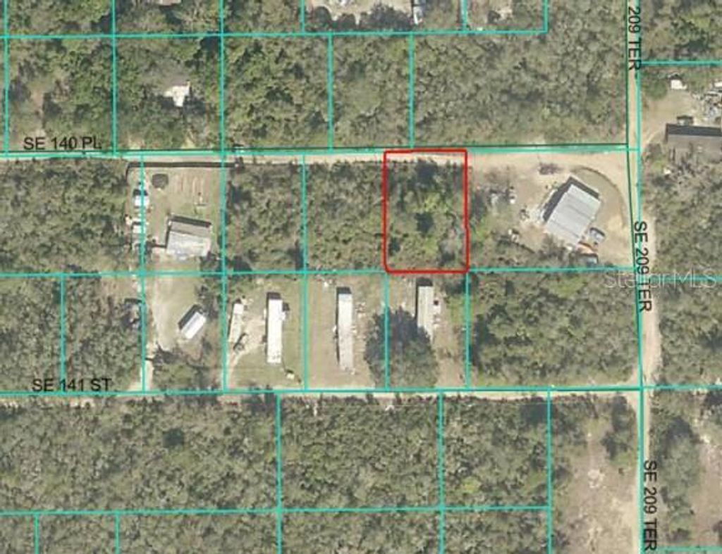 Photo of 33 SE 140th Place, Umatilla, FL 32784 (MLS # OM711103)