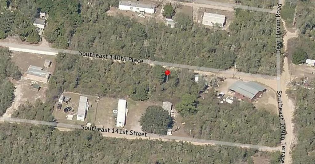 Photo of 33 SE 140th Place, Umatilla, FL 32784 (MLS # OM711103)