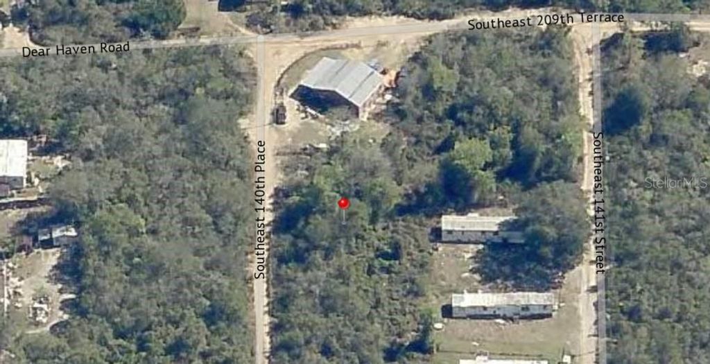 Photo of 33 SE 140th Place, Umatilla, FL 32784 (MLS # OM711103)