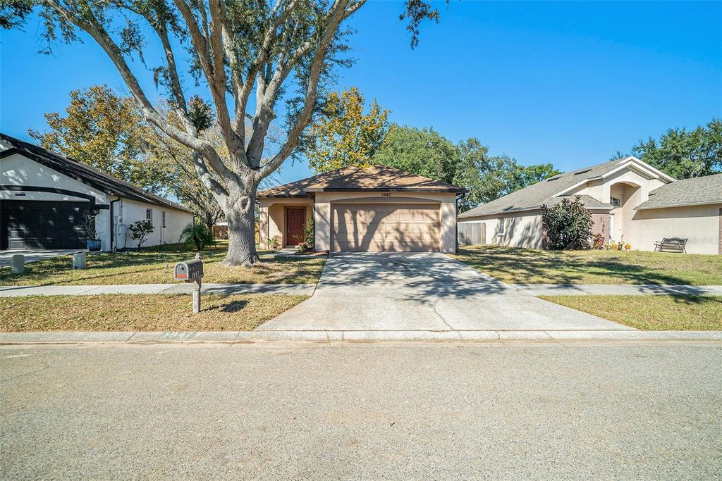 Photo of 1947 Tinker Drive, Lutz, FL 33559 (MLS # TB8448349)