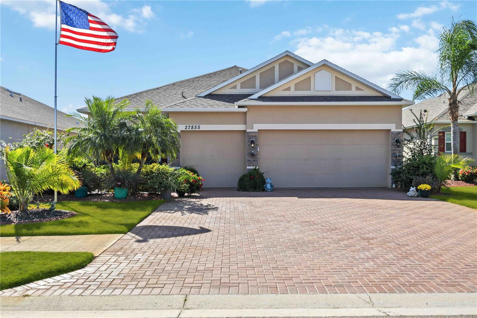 **BACK ON THE MARKET with and IMPROVED PRICE ~ Buyer Unfortunately had to cancel due to health reasons**
Modern Lakefront Living with a $0 Electric Bill! Experience the future of homeownership at 27855 Arrowhead Circle. This stunning Punta Gorda lake view residence combines sophisticated style with unparalleled energy efficiency, offering a truly modern and sustainable lifestyle. The cornerstone of this home is a fully owned photovoltaic solar system, which has historically resulted in a net-zero or even negative electric bill. Paired with a hybrid electric heat pump water heater and impact-rated sliders, this property is engineered for exceptionally low running costs and peace of mind. Inside, you'll find nearly 2,500 sq. ft. of beautifully designed space. The open-plan living area flows into a chef's kitchen equipped with granite countertops, stainless steel appliances, and a fabulous center island with a separate bar and wine fridge. This residence offers exceptional flexibility with 3 bedrooms plus a bonus room (ideal as a 4th bedroom or office), an air-conditioned Florida room, and a brand-new screened lanai overlooking the tranquil lake. From the professionally landscaped, lake-irrigated yard to the immaculate 3-car garage with epoxy flooring, every element has been upgraded for quality and convenience. Details like tray ceilings, crown molding, and a new paver driveway complete this exceptional package. Why just buy a home when you can invest in a smarter, more sustainable future? Don't miss the full video walk-through! Schedule your exclusive tour today to see how luxury and efficiency coexist perfectly.