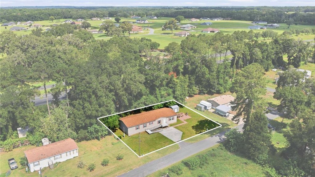 Photo of 8450 NW 15th Avenue, Ocala, FL 34475 (MLS # O6415545)