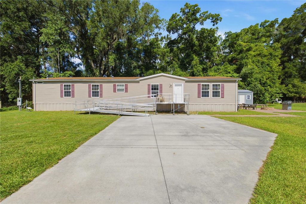 Photo of 8450 NW 15th Avenue, Ocala, FL 34475 (MLS # O6415545)