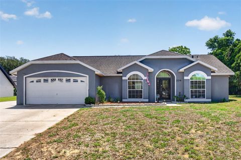 Photo of 204 Montana Avenue, Davenport, FL 33897 (MLS # O6399266)