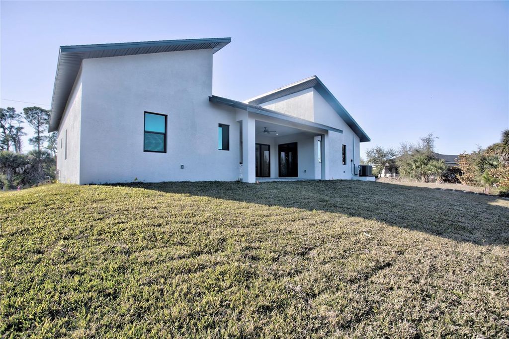 Photo of 9574 Salt Lake Street, Port Charlotte, FL 33981 (MLS # D6145975)