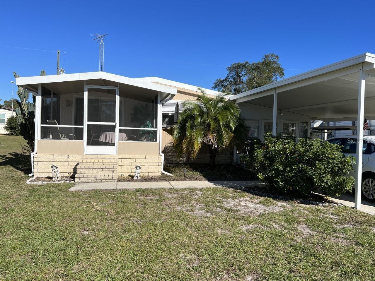 MORE PHOTOS COMING!! Beautifully maintained and upgraded 2 bedroom, 2 bathroom home in rural lake front 55+ manufactured home community. The home is completely and nicely furnished, and ready to move into. This community is located on the largest lake in Polk County and is known for trophy Bass. A huge Florida room is great for enjoying your morning coffee, or entertaining. If you're looking for a peaceful, serene setting, this is it. Enjoy the peace and quiet of rural living but still close to everything. Orlando attractions are an hour away. Beaches on both coasts are an hour and a half drive. Make your appointment for a private showing.