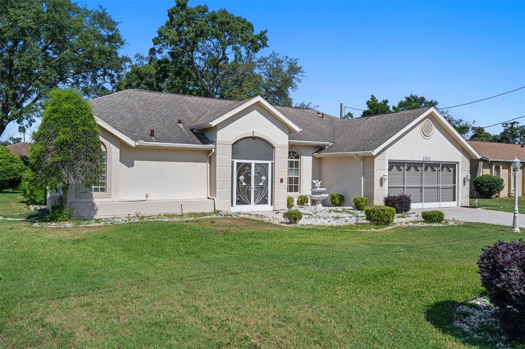Photo of 1241 Persian Avenue, Spring Hill, FL 34608 (MLS # OM723871)