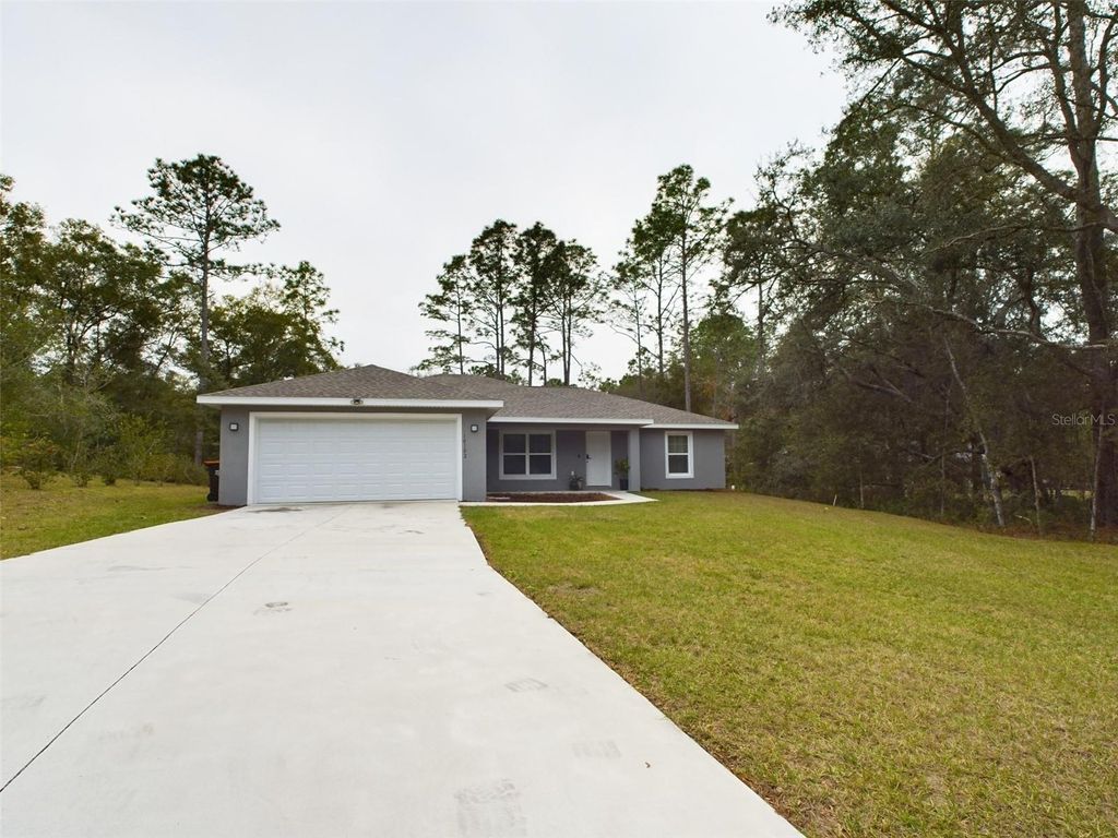 Photo of 10102 SW 188th Circle, Dunnellon, FL 34432 (MLS # OM723824)