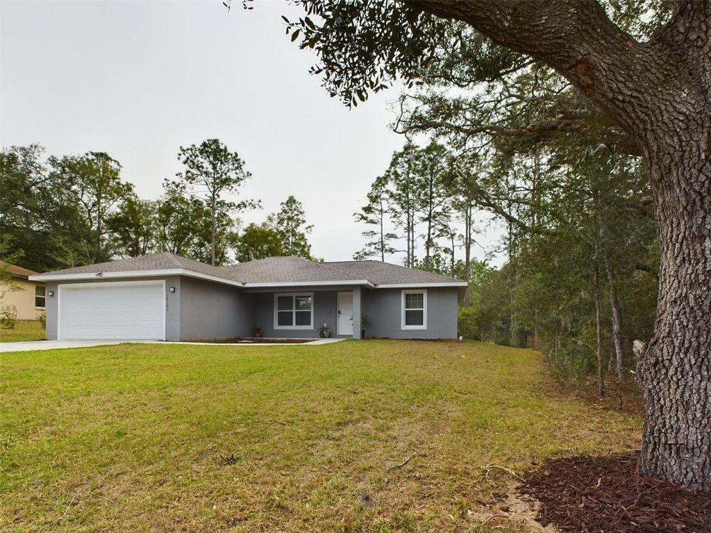 Photo of 10102 SW 188th Circle, Dunnellon, FL 34432 (MLS # OM723824)