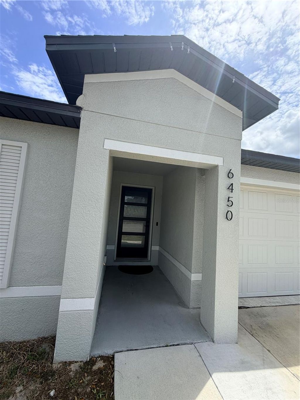 Photo of 6450 Mariner Boulevard, Spring Hill, FL 34609 (MLS # TB8493190)