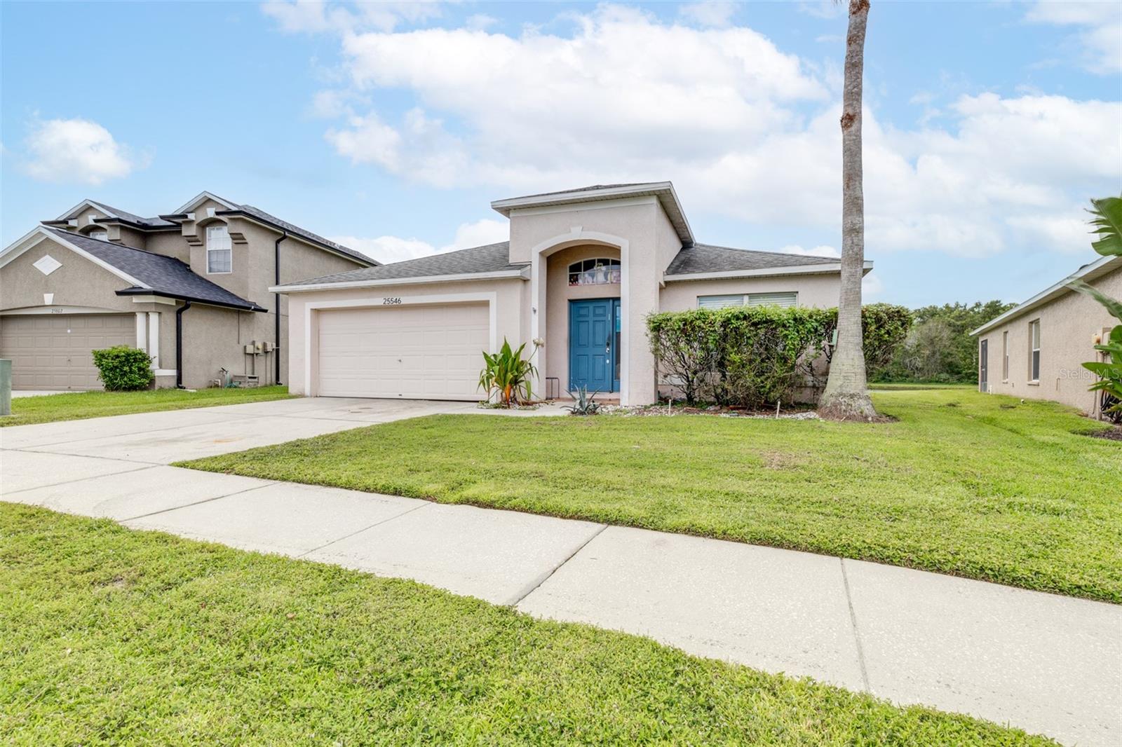 Discover the potential of this charming 3-bedroom, 2-bathroom home located in the desirable Grand Oaks community at 25546 Bruford Blvd. Nestled on a tranquil lakefront lot, this property offers peaceful water views right from your backyard the perfect backdrop for morning coffee or evening relaxation. 2021 ROOF REPLACED, 2024 HOT WATER HEATER REPLACED.
Inside, the home offers a spacious split floor plan with lots of natural light and a functional layout. While the property needs some interior updates and cosmetic repairs, it has strong bones and is ready for your personal touch. Whether you're an investor, first-time buyer, or looking for a home you can customize, this is a great opportunity in a prime location.