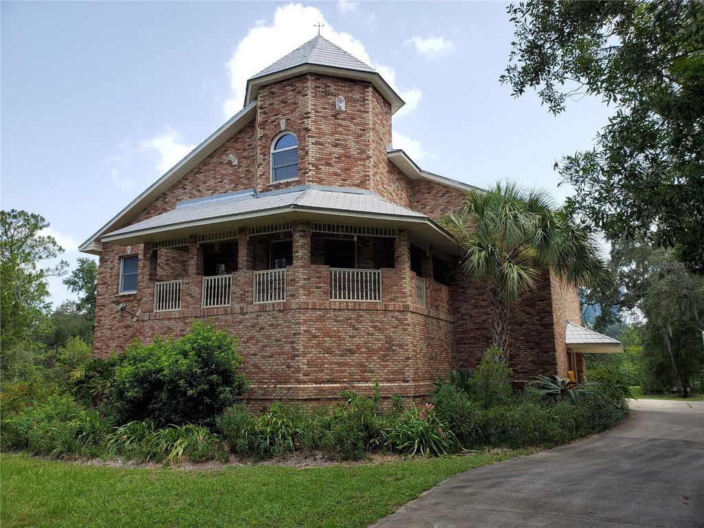 Photo of 5422 Cyril Drive, Dade City, FL 33523 (MLS # W7890176)