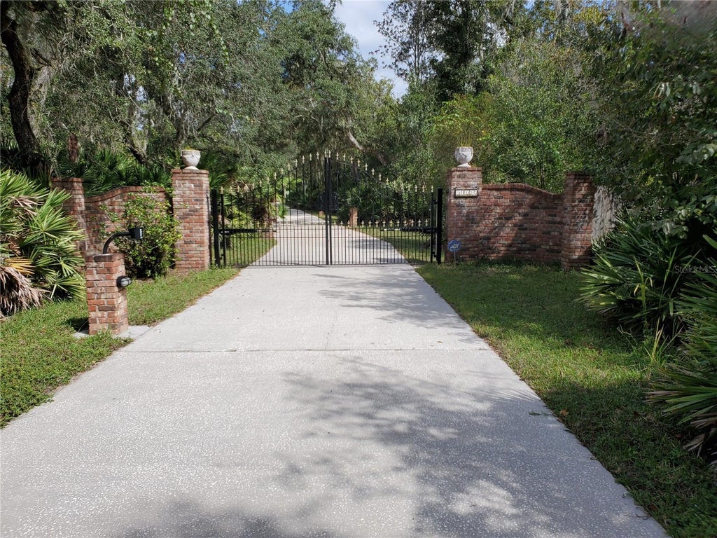 Photo of 5422 Cyril Drive, Dade City, FL 33523 (MLS # W7890176)