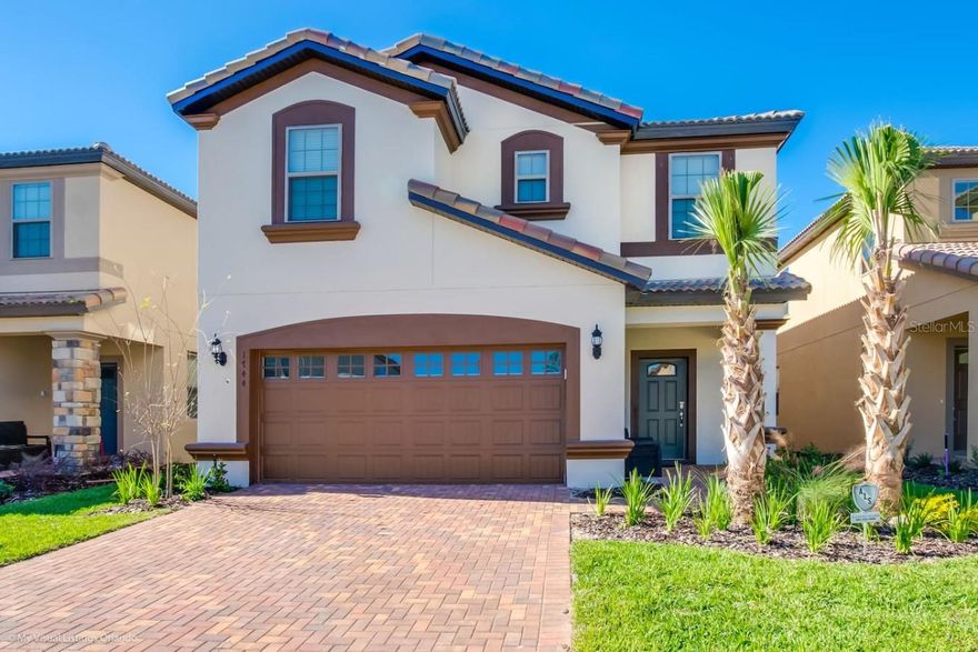 Experience the ultimate Orlando getaway in this beautifully appointed 7-bedroom, 5.5-bath vacation home located in the highly desirable Windsor at Westside Resort, just minutes from Walt Disney World and Central Florida’s top attractions. Designed for comfort, relaxation, and entertaining, this spacious villa is ideal for large families, vacation groups, or short-term rental investment opportunities.

The home features an inviting open-concept layout with generous living spaces on both levels, providing plenty of room for everyone to gather and unwind. The upstairs loft offers an additional entertainment area complete with a large TV, comfortable seating, and ample space for movie nights or game days.

Step outside to your private west-facing screened lanai where you can enjoy sunny Florida afternoons by the sparkling pool and spa, lounge poolside, or relax under the covered patio while taking in peaceful views.

The equipped kitchen includes a breakfast bar, abundant cabinetry, and things needed for meal preparation.

Bedroom accommodations include:

First-floor primary suite with king bed and private ensuite bath
Additional half bath on the main floor
Second-floor king suite with ensuite bath
Second-floor queen suite with ensuite bath
One queen bedroom
Two bedrooms with twin beds
One bunk room featuring a twin-over-full bunk bed
Shared full bathrooms conveniently located between secondary bedrooms
All bedrooms include TVs and generous storage space

Residents and guests of Windsor at Westside enjoy access to outstanding resort-style amenities, including a lazy river, water slide, resort pool, tiki bar, clubhouse, fitness center, arcade, sports courts, and hot tubs.

Conveniently located near Disney World, Universal Studios, SeaWorld, championship golf courses, shopping outlets, dining, and entertainment. Measurements are approximate and should be independently verified. Some furniture has been updated