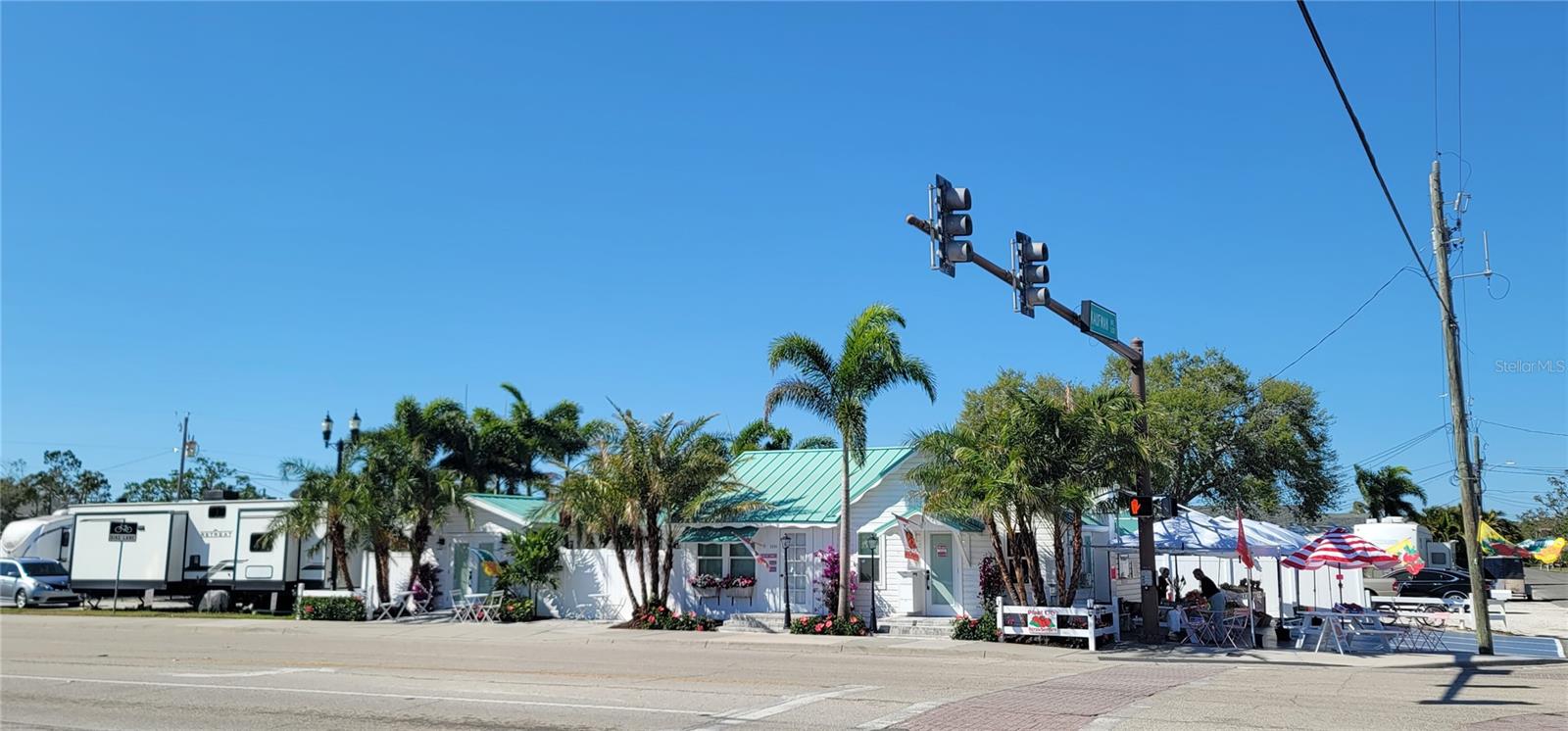 Corner of Bahia Vista and Kaufman! A wonderful commercial opportunity! Family-Owned business location for nearly 60 years Grandfathered zoning allows commercial and residential uses simultaneously. Endless possibilities in the heart of Pinecraft Community in Sarasota, Florida. Excellent Business location with road frontage on a hard corner! Commercial Refrigeration unit, 2 sheds and storage. Sarasota County Water and Sewer with well for irrigation. New plantings on the exterior and new pavers! New PVC Fencing and separate living areas. This could be divided into separate units or take one for yourself and Live/Work in paradise! 3/2 with rental possibilities!