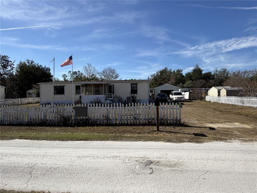 This 1984 manufactured home sits on a spacious .51-acre fully fenced lot and offers tremendous potential for the right buyer. With solid improvements already in place including a NEW ROOF, new HVAC, and newer plumbing with no polybutylene pipes.

The home features 3 bedrooms, each with a walk-in closet, a large Florida room, and indoor laundry with storage shelves, work space, and a dedicated hot water heater for the washing machine. The kitchen includes wood cabinets, a breakfast bar, and newer appliances. A 100-gallon propane tank powers the range, dryer, and the included generator.

Outside, you’ll find a detached 2-car garage with electric and workshop area, perfect for projects or storage needs. The fully fenced yard provides ample space for pets, gardening, or future outdoor enhancements.

Conveniently located close to shopping, restaurants, and hospitals.