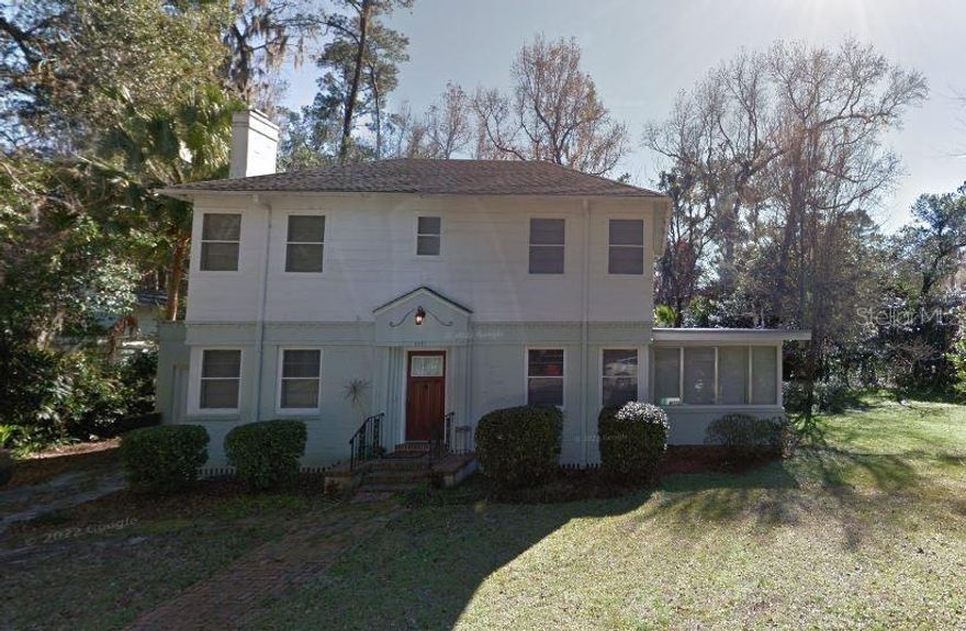 Tucked into the highly sought-after Golfview neighborhood, just steps from the University of Florida Golf Course and within easy walking distance to campus, this cherished home offers a rare blend of character, history, and opportunity. Lovingly held in the same family for over 60 years, it tells a story you can feel the moment you walk through the door.
Inside, you’ll find 4 bedrooms and 2.5 baths, complemented by original wood floors that run throughout the home, adding warmth and timeless appeal. Tall ceilings enhance the sense of space, while the oversized sunroom invites natural light and creates the perfect setting for relaxing, entertaining, or simply enjoying the peaceful surroundings.
One of the home’s most distinctive features is its custom wallpaper in the kitchen and hallway—an extraordinary collection of vintage beer labels curated by the original owner, preserved beautifully over decades as a truly one-of-a-kind conversation piece.
The property itself is equally special. The current owner and neighboring property thoughtfully divided the adjoining land, resulting in an oversized lot that offers both privacy and flexibility. With city approval, there is potential to add an accessory dwelling unit (ADU), opening the door for rental income, a guest house, or multigenerational living.
Complete with a one-car garage and situated in a location that combines charm, convenience, and long-term value, this home is a rare opportunity to own a piece of local history while imagining its next chapter.