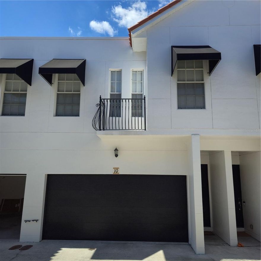 Located in beautiful South Tampa, this townhome will satisfy your modern urban living needs. Beautifully built and maintained with block construction, 11 ft ceilings, hardwood flooring on the first floor, carpet on 2nd, crown
molding throughout, and recently painted. The open floor plan with a family room and dining area is versatile but still comfortable for entertaining family and friends. The kitchen comes with granite counters, new sink, and
wood cabinets with enough space for your inner chef. French doors lead out to a small patio area. Upstairs the bedrooms are split plan with the master suite that has ample room for a sitting area or exercise equipment
and en suite bathroom comes with dual sinks, separate shower and tub. At the end of the hall are two additional nice sized bedrooms and 2nd full bathroom. There is no more parking on the street because this townhome
comes with a 2 car garage. Gated community and within minutes to all South Tampa has to offer, trendy & upscale dining, boutique shops, Bayshore Blvd and Water Street.