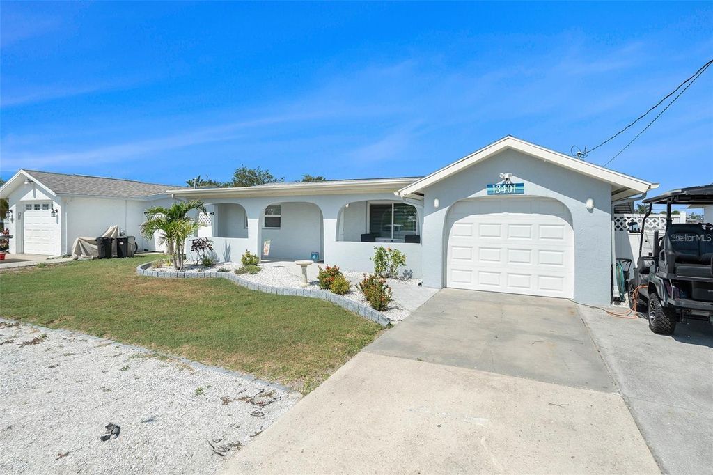 Photo of 13401 Neptune Drive, Hudson, FL 34667 (MLS # TB8468520)