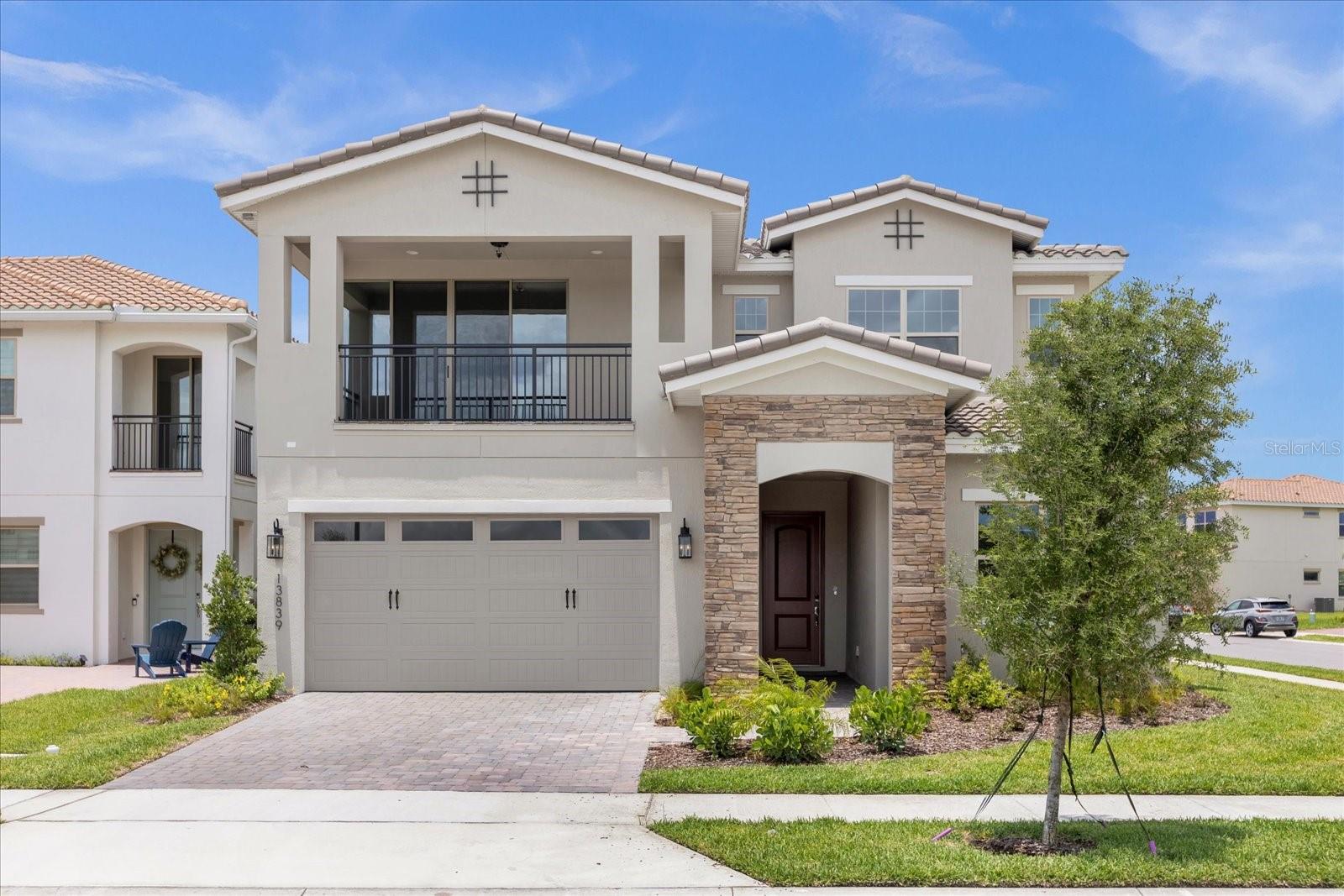 One or more photo(s) has been virtually staged. FOR RENT: One or more photo(s) has been virtually staged.NEW CONSTRUCTION – COMPLETED MARCH 2024 Welcome to this stunning, fully upgraded 5-bedroom, 5.5-bath home with over 4,000 square feet of living space, located in the highly desirable gated and golf community of Eagle Creek in Lake Nona. This beautifully designed residence sits on a serene pond-front lot with breathtaking views from both the first and second floors. The open-concept floor plan offers elegant formal spaces and comfortable casual areas, ideal for both everyday living and entertaining. The chef-style kitchen features dual oversized islands, smart stainless steel appliances, a spacious walk-in pantry, and bright, connected living and dining areas. Sliding glass doors lead to an extended covered lanai with pavers, a half wall pre-plumbed for a summer kitchen—perfect for enjoying Florida evenings in style. Upstairs, enjoy a loft with built-in window seating—ideal for a pool table, media center, or playroom. The luxurious primary suite offers balcony access with tranquil pond views, dual vanities, a rain shower with a built-in bench, and a massive walk-in closet that connects directly to the laundry room. The home’s layout is designed with flexibility: Main-level guest suite with private bath and walk-in closet Third bedroom opens to lanai with private bath and floor-to-ceiling sliding door Fourth bedroom with en-suite Fifth bedroom with private balcony overlooking the front of the home Additional Features: Smart Home Technology with full security wiring and automation Wired 360° exterior camera coverage Programmable high-efficiency A/C and heating system Custom outlets throughout for seasonal lighting (Christmas-ready) Mediterranean-style concrete tile roof Oversized 3-car tandem garage Brick paver driveway Eagle Creek Community Amenities Include: 24-hour guard-gated entrance Championship 18-hole golf course and clubhouse Resort-style pool & splash pad Fitness center, sports courts (basketball, tennis, multi-purpose field) Playground, parks, dog park, and pavilions On-site restaurant and pro shop Location Highlights: 20 minutes to Orlando International Airport Minutes from Medical City, Boxi Park, shopping, restaurants, and entertainment Easy access to 417 & 528 Close to top-rated schools and Lake Nona Performance Club, offering 100+ fitness classes, indoor track, aquatics, Technogym equipment, sauna/steam rooms, and more. This is your opportunity to own a move-in ready, modern luxury home in one of Lake Nona’s most desire neighborhoods. Live the golf and resort lifestyle with convenience, elegance, and comfort.