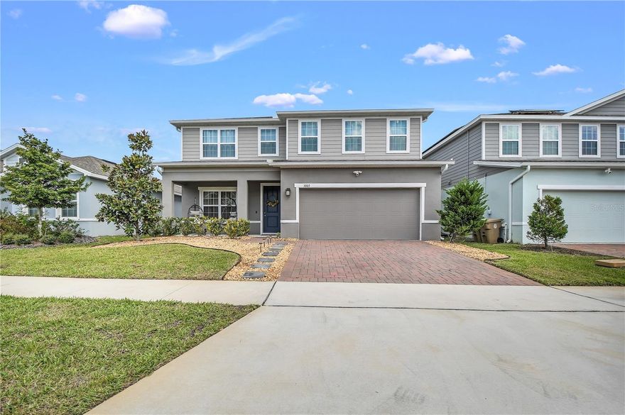 Welcome to 3005 Slough Creek Dr – a beautifully designed, move-in-ready home built in 2022 and thoughtfully updated for modern living. Boasting over 2,700 sq ft, this flexible floorplan features 4 bedrooms, 3 bathrooms, plus a loft and flex room—ideal for a home office, gym, or 5th bedroom conversion with an additional office downstairs. Inside, you'll love the fresh designer touches including new kitchen hardware (2024) and modern light fixtures (2023) that elevate the home’s bright and open layout. Durable tile flooring in main areas complements the contemporary design, while plush carpet adds comfort to bedrooms and upstairs spaces. The kitchen opens to the living and dining areas, making it perfect for entertaining. Step outside to a lake view backyard where new gutters (2023) provide long-term protection and curb appeal. Located in a growing, family-friendly community near schools, shopping, major highways, and Central Florida attractions, this home offers both convenience and comfort in a prime Kissimmee location. Don’t miss your chance to own this nearly new, upgraded home—schedule your showing today!