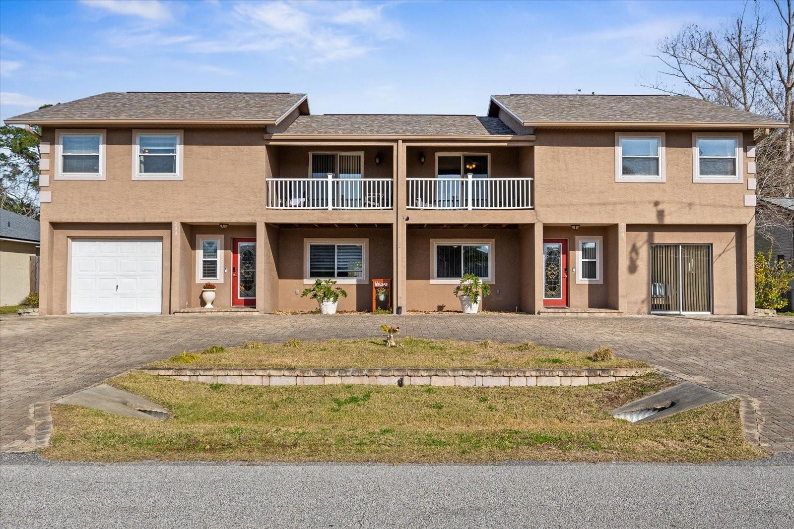 Welcom to this stunning, completely updated 2 unit townhouse duplex—boasting the best of everything! Located in the highly sought-after Palm Harbor area of Palm Coast, this property is move-in ready for new owners. With spacious units, it’s perfect for both investors and families who want to live together in comfort. Each side has been fully updated, featuring newer kitchen cabinets, granite countertops, and modern appliances. The bathrooms are all updated too, with matching cabinets and granite countertops, totaling 6 beautiful bathrooms across both units. The master suites, located on the second floor, offer private balconies, large walk-in closets, and ensuite bathrooms. The home also showcases tile and wood flooring throughout, adding a sleek touch to the entire space. On the exterior, you'll find all-new stucco, windows, and doors. The property is fully fenced for privacy and includes a spacious concrete patio, along with a separate fenced yard space. Mature trees fill the backyard, which is equipped with a sprinkler system on a deep well. There's also a large 10x20 storage shed on side A. This property offers great potential for short-term rental opportunities as well. Plus, the roof was replaced in September 2021. Don’t miss out—schedule your showing today, as this one won’t last long!