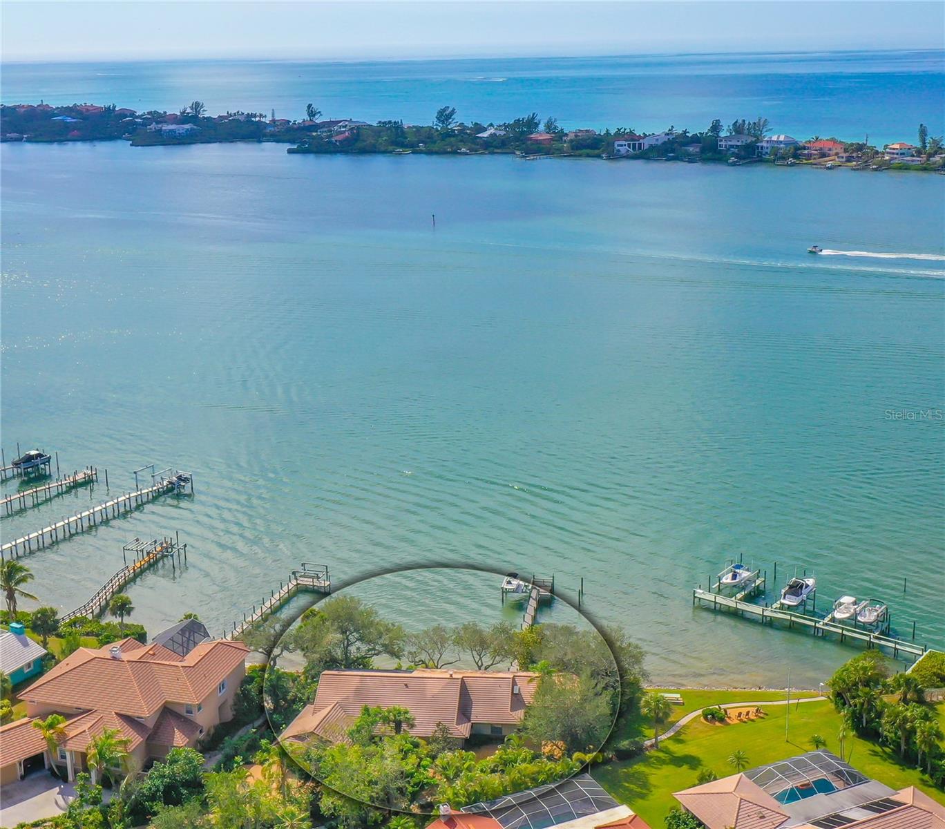 The west-facing property is tucked away on 135 feet of shoreline on the widest section of Blackburn Bay and showcases spectacular sunsets over Casey Key. The residence has a lovely screened pool and deck with a bay view framed by oaks, seagrapes and Florida friendly landscaping. Happy hour, anyone? It’s likely you’ll see manatees swimming around the dock and dolphins jumping in the bay, as well as, sea and shorebirds. There’s easy boat access to the Gulf of Mexico through the Venice Jetties under the Albee Bridge to the south and Big Pass in Sarasota Bay through the Blackburn Point swing bridge to the north. Dock at one of the many restaurants along the Intercoastal waterway. Take a short 5 mile trip by car to bustling and renewed downtown Venice to shop and dine, or travel 20 miles north to downtown Sarasota, the “cultural mecca of Florida.” Consider renting a golf cart for your stay! It’s only 3 miles on the back road to Nokomis Public Beach on pristine and exclusive Casey Key where shelling is bountiful and fun is guaranteed. 421 Waterside’s location is secluded and serene yet, quick access to grocery stores, pharmacies, retail, hospital and gas. Term of 6+ months will be considered.