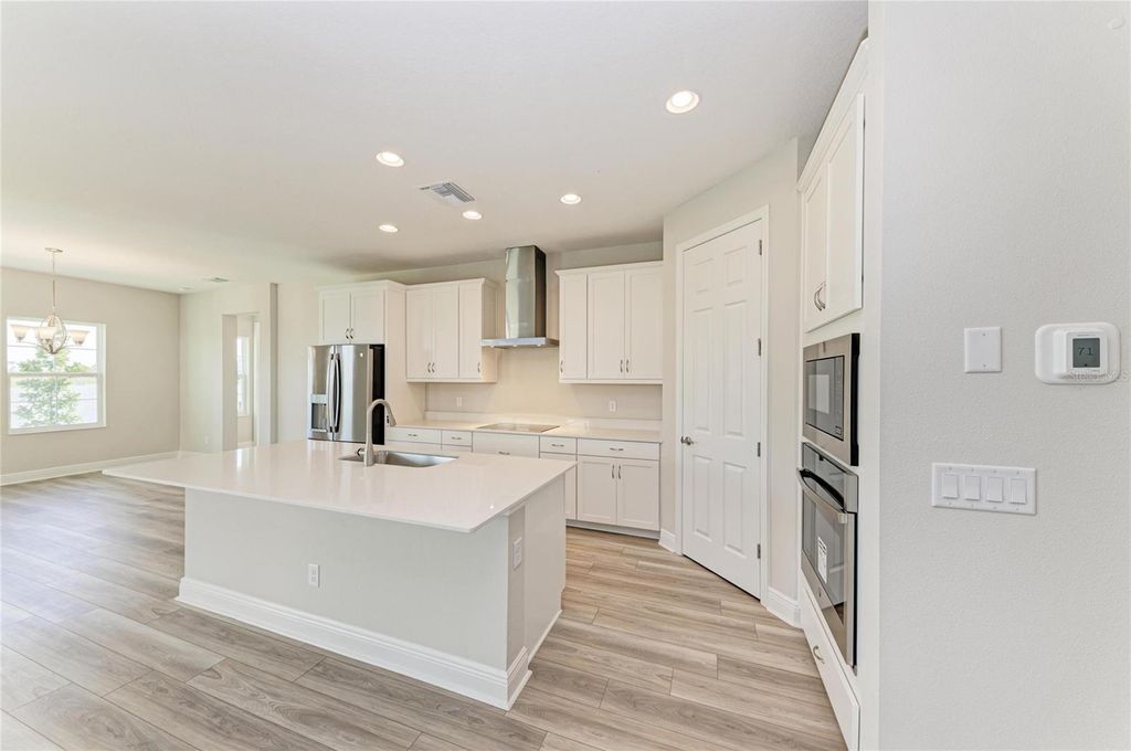 Photo of 10148 Surrey Rose Drive, San Antonio, FL 33576 (MLS # TB8447378)