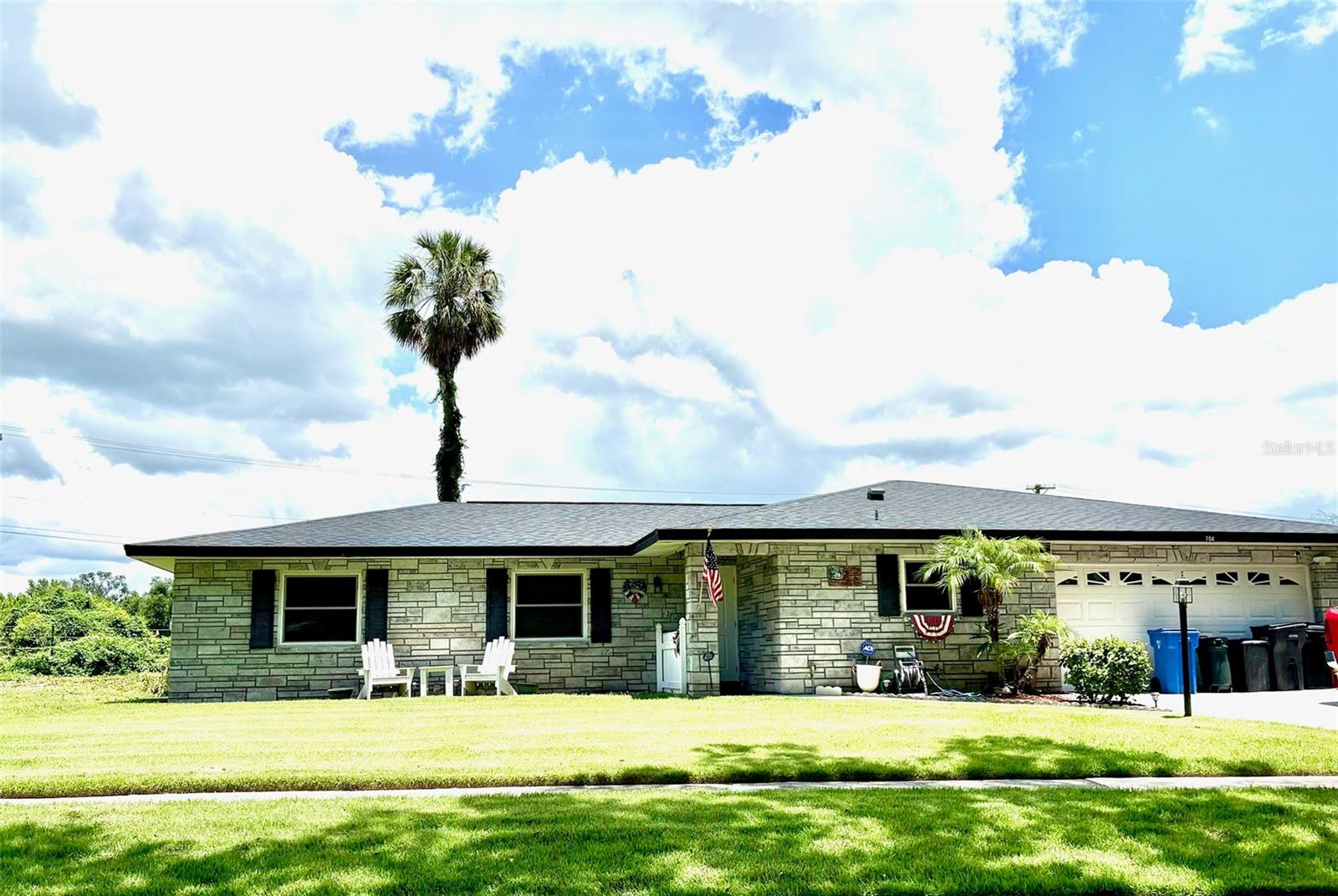 Great location with easy access to all major highways and central Florida attractions. Lots of updates to this move-in ready 3 bedroom, 2 bath home. Some of the updates include: New South Energy Efficient Windows and Doors throughout; installed right before storm Milton. New luxury vinyl flooring throughout the living area, dining room and bedrooms. Tiled entry, kitchen and baths. New roof 2019. New A/C, including air ducts and intake installed 2020. Hot water heater, May, 2025. All new lighting fixtures, fans, light switches, sockets and plate covers. Remote control fans for LR, Master & Secondary BR. Traditional but new fan in Office/3rd bedroom. The kitchen has Corian counters, lots of cabinet and counter space and a complete Samsung appliance package. The kitchen opens into the dining room and straight through to the living room for an open concept. Enjoy lots of natural light while enjoying your living room that opens to the oversized lanai through new French doors. The master suite has a walk-in closet, single vanity and spacious shower. The second bedroom comfortably fits a queen sized bed and large closet. The 3rd bedroom/office is good size and also has a full length wall closet. The 2nd bath has a blue tooth vent/light, single vanity and tub/shower. The 2-car garage has a work bench w/shelves and lots of room for storage and rear entrance to the covered lanai. To finish off the package the rear is fenced and an over-sized screened lanai. Schedule your appointment today for your private showing. You won't be disappointed!