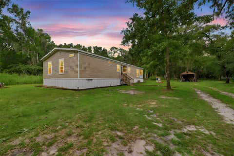Photo of 16184 Paxford Lane, Brooksville, FL 34601 (MLS # W7887670)