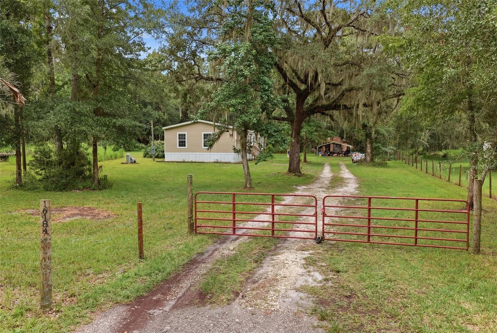 Photo of 16184 Paxford Lane, Brooksville, FL 34601 (MLS # W7887670)