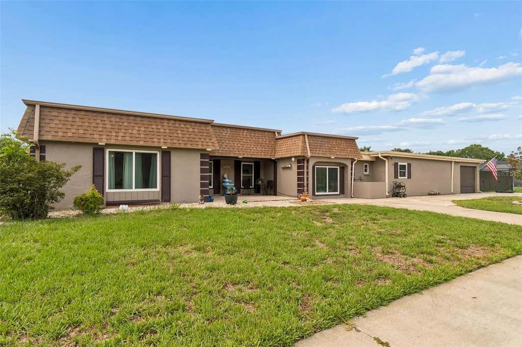 Photo of 4306 Newbury Drive, New Port Richey, FL 34652 (MLS # W7887880)