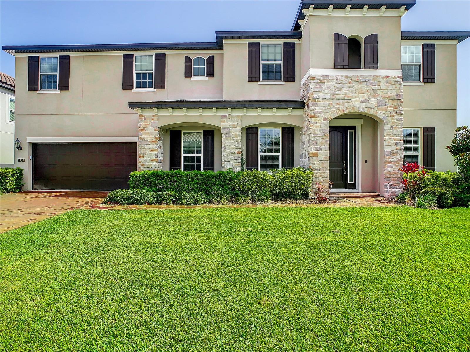 Come view this beautiful Meritage home in McAllister Landing. Perfect opportunity for you to own and enjoy a beautiful energy-efficient home all year long. This home is a SIX -bedroom, four-bath, three-car garage p with lots of natural lighting.a The floor plan includes a gourmet kitchen, granite countertops, a huge walk-in pantry, The beautiful kitchen also includes stainless steel appliances and 42-inch designer cabinetry with crown molding. Also, on the first floor, you will find an oversized office/bonus room and a guest bedroom with a separate full bath. You will love the huge master suite located on the second floor, featuring granite vanities, a glass walk-in shower, garden tub, separate toilet room and a huge walk-in closet. On the second floor, you will love the other three bedrooms, each with huge walk-in closets, two large walk-in closets in the hallway, which gives you plenty of space for everything you own and a huge media room that will be great for family movie night. The possibilities in this home are endless, something you will not want to miss.cAllister Landing is Located just a few minutes from the shops, restaurants and entertainment in Historic Downtown Winter Garden, McAllister Landing offers lakeside living in large, beautiful homes. Community amenities will include a dock on Lake Apopka, parks and walking trails. it is short drive to winter garden village and 5 min to turnpike , at winter garden but without winter garden rush hour traffic 25 min from downtown , 20 min from Maitland come see it yourself